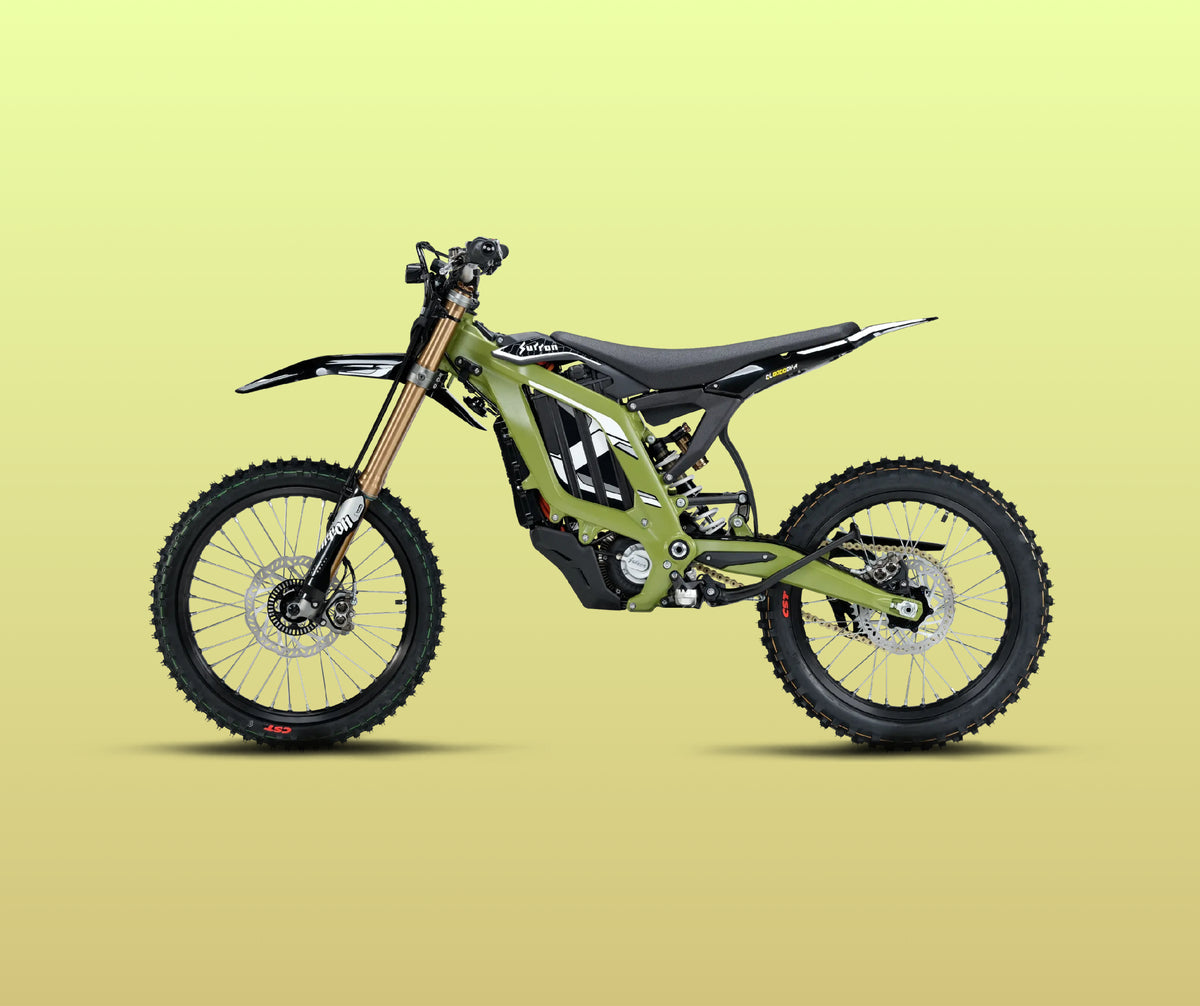 Green 2026 Sur-Ron Light Bee 2 LBX2 electric dirt bike side profile showing reinforced frame, gold USD front suspension forks, mid-drive motor, and CST knobby tires.