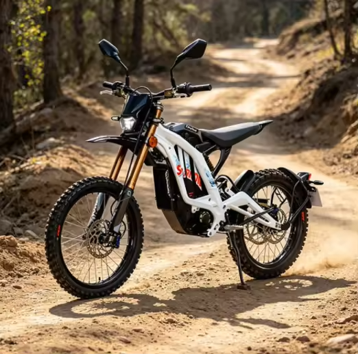 2026 Sur-Ron Light Bee X 3C street-legal electric dirt bike in white and red featuring factory mirrors, LED turn signals, license plate bracket, and 72V 10kW powertrain.